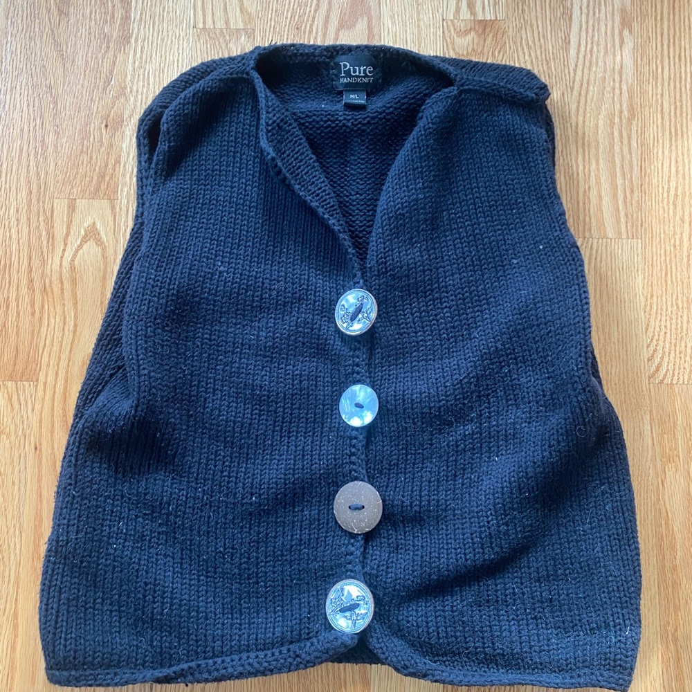 Hand-knit. 100% handmade. Made in Thailand. Gorgeous wooden buttons.